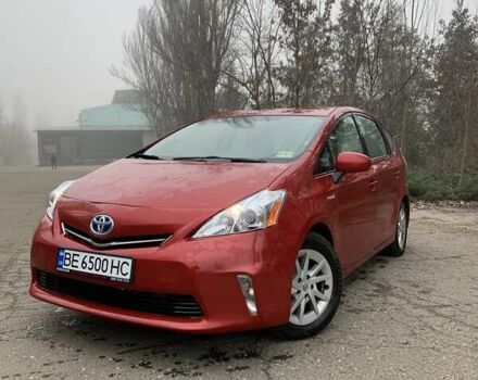 Красный Тойота Prius v, объемом двигателя 1.8 л и пробегом 225 тыс. км за 14100 $, фото 1 на Automoto.ua