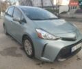 Зеленый Тойота Prius v, объемом двигателя 1.8 л и пробегом 255 тыс. км за 12800 $, фото 1 на Automoto.ua