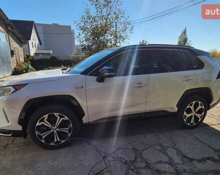 Белый Тойота RAV4 PHEV, объемом двигателя 2.49 л и пробегом 90 тыс. км за 42000 $, фото 2 на Automoto.ua