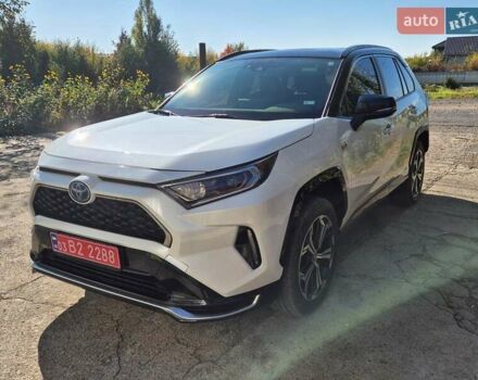 Белый Тойота RAV4 PHEV, объемом двигателя 2.49 л и пробегом 90 тыс. км за 42000 $, фото 1 на Automoto.ua
