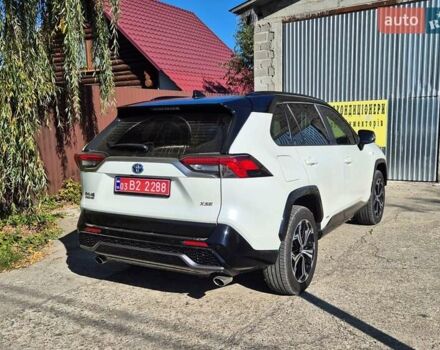 Белый Тойота RAV4 PHEV, объемом двигателя 2.49 л и пробегом 90 тыс. км за 42000 $, фото 4 на Automoto.ua