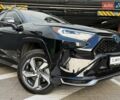 Черный Тойота RAV4 PHEV, объемом двигателя 2.49 л и пробегом 71 тыс. км за 40990 $, фото 1 на Automoto.ua