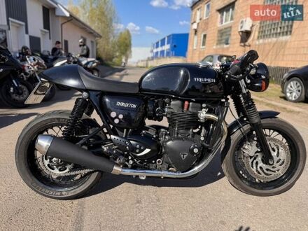 Черный Триумф Thruxton, объемом двигателя 1.2 л и пробегом 27 тыс. км за 9900 $, фото 1 на Automoto.ua