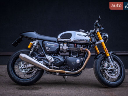 Черный Триумф Thruxton, объемом двигателя 1.2 л и пробегом 3 тыс. км за 18500 $, фото 1 на Automoto.ua