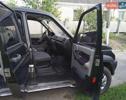 Черный УАЗ 3163 Patriot, объемом двигателя 2.7 л и пробегом 297 тыс. км за 6600 $, фото 5 на Automoto.ua