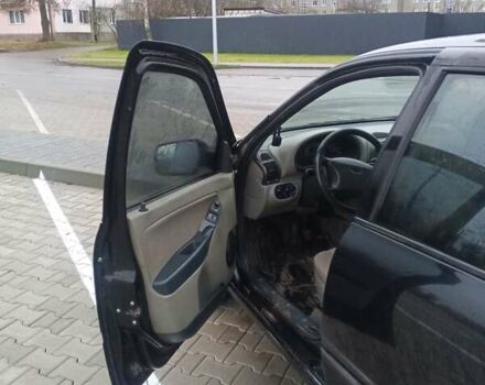 Черный ВАЗ 1117 Калина, объемом двигателя 1.6 л и пробегом 204 тыс. км за 2750 $, фото 13 на Automoto.ua