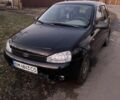 Черный ВАЗ 1117 Калина, объемом двигателя 1.4 л и пробегом 200 тыс. км за 2700 $, фото 1 на Automoto.ua