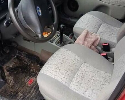 Красный ВАЗ 1117 Калина, объемом двигателя 1.6 л и пробегом 150 тыс. км за 2500 $, фото 4 на Automoto.ua