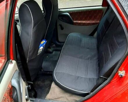 Красный ВАЗ 1117 Калина, объемом двигателя 1.6 л и пробегом 124 тыс. км за 2800 $, фото 2 на Automoto.ua