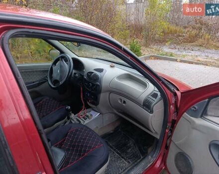 Красный ВАЗ 1117 Калина, объемом двигателя 1.6 л и пробегом 260 тыс. км за 1650 $, фото 10 на Automoto.ua