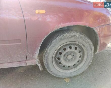 Красный ВАЗ 1117 Калина, объемом двигателя 1.4 л и пробегом 196 тыс. км за 1250 $, фото 2 на Automoto.ua