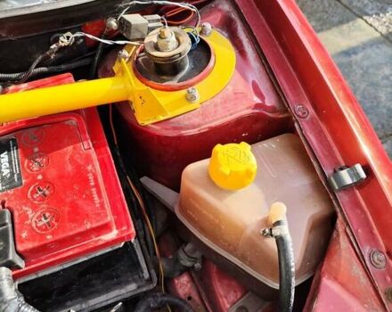 Червоний ВАЗ 1117 Калина, об'ємом двигуна 1.6 л та пробігом 250 тис. км за 1714 $, фото 13 на Automoto.ua