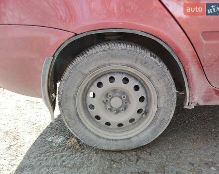 Красный ВАЗ 1117 Калина, объемом двигателя 1.4 л и пробегом 196 тыс. км за 1250 $, фото 3 на Automoto.ua
