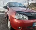Красный ВАЗ 1117 Калина, объемом двигателя 1.6 л и пробегом 180 тыс. км за 3000 $, фото 1 на Automoto.ua