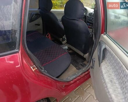 Красный ВАЗ 1117 Калина, объемом двигателя 1.6 л и пробегом 260 тыс. км за 1650 $, фото 1 на Automoto.ua