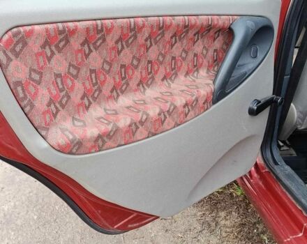 Красный ВАЗ 1117 Калина, объемом двигателя 1.6 л и пробегом 190 тыс. км за 2150 $, фото 7 на Automoto.ua