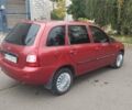 Красный ВАЗ 1117 Калина, объемом двигателя 1.39 л и пробегом 204 тыс. км за 2550 $, фото 5 на Automoto.ua