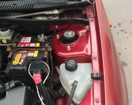 Красный ВАЗ 1117 Калина, объемом двигателя 1.39 л и пробегом 205 тыс. км за 2700 $, фото 14 на Automoto.ua