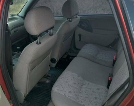 Красный ВАЗ 1117 Калина, объемом двигателя 1.4 л и пробегом 88 тыс. км за 3600 $, фото 12 на Automoto.ua