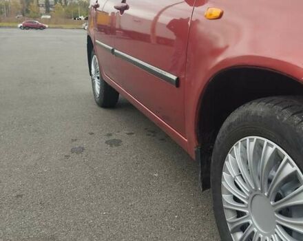 Красный ВАЗ 1117 Калина, объемом двигателя 1.39 л и пробегом 205 тыс. км за 2700 $, фото 7 на Automoto.ua