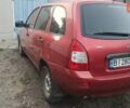 Красный ВАЗ 1117 Калина, объемом двигателя 1.39 л и пробегом 214 тыс. км за 2300 $, фото 3 на Automoto.ua