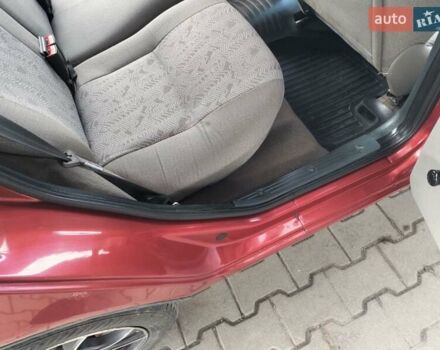 Красный ВАЗ 1117 Калина, объемом двигателя 1.4 л и пробегом 88 тыс. км за 3600 $, фото 21 на Automoto.ua