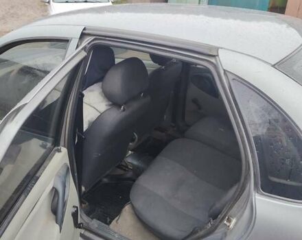 Серый ВАЗ 1117 Калина, объемом двигателя 1.39 л и пробегом 162 тыс. км за 2000 $, фото 4 на Automoto.ua