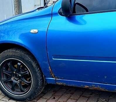 Синий ВАЗ 1117 Калина, объемом двигателя 1.6 л и пробегом 200 тыс. км за 1000 $, фото 5 на Automoto.ua