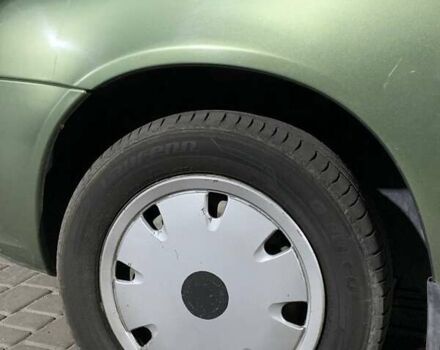 Зеленый ВАЗ 1117 Калина, объемом двигателя 1.39 л и пробегом 91 тыс. км за 3300 $, фото 6 на Automoto.ua