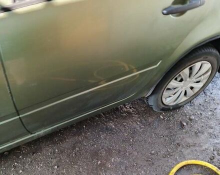 Зеленый ВАЗ 1117 Калина, объемом двигателя 1.39 л и пробегом 234 тыс. км за 2800 $, фото 15 на Automoto.ua