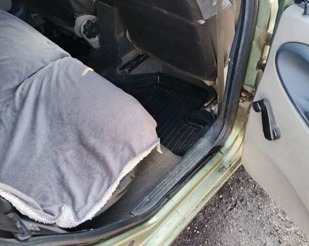 Зеленый ВАЗ 1117 Калина, объемом двигателя 1.39 л и пробегом 234 тыс. км за 2800 $, фото 5 на Automoto.ua