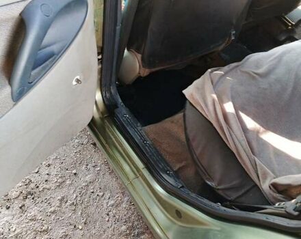 Зеленый ВАЗ 1117 Калина, объемом двигателя 1.39 л и пробегом 234 тыс. км за 2800 $, фото 23 на Automoto.ua