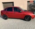Красный ВАЗ 1118, объемом двигателя 1.4 л и пробегом 125 тыс. км за 2850 $, фото 1 на Automoto.ua
