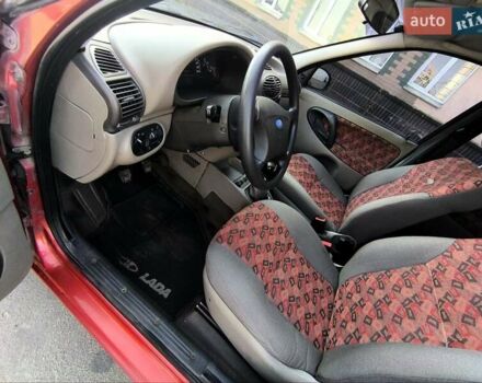 Красный ВАЗ 1119 Калина, объемом двигателя 1.6 л и пробегом 113 тыс. км за 2300 $, фото 13 на Automoto.ua