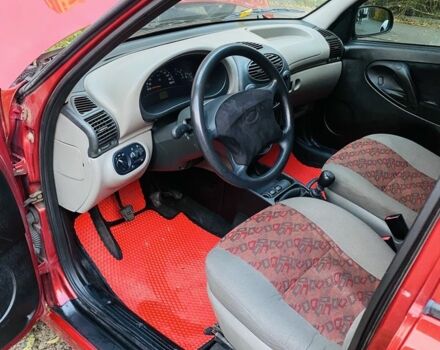 Красный ВАЗ 1119 Калина, объемом двигателя 1.4 л и пробегом 170 тыс. км за 1700 $, фото 6 на Automoto.ua