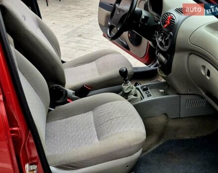 Червоний ВАЗ 1119 Калина, об'ємом двигуна 1.39 л та пробігом 224 тис. км за 2150 $, фото 11 на Automoto.ua