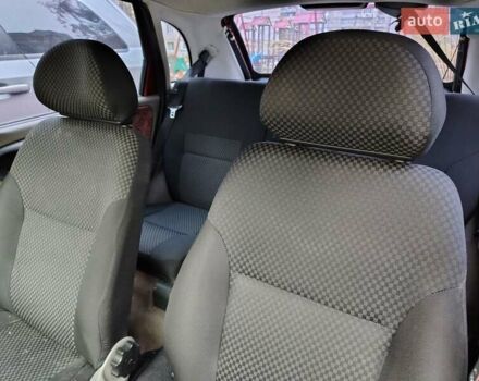 Красный ВАЗ 1119 Калина, объемом двигателя 1.6 л и пробегом 270 тыс. км за 1500 $, фото 5 на Automoto.ua