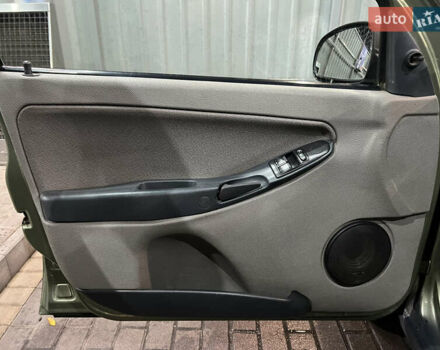 Зелений ВАЗ 1119 Калина, об'ємом двигуна 1.6 л та пробігом 198 тис. км за 2000 $, фото 23 на Automoto.ua