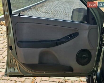 Зеленый ВАЗ 1119 Калина, объемом двигателя 1.4 л и пробегом 89 тыс. км за 1999 $, фото 12 на Automoto.ua