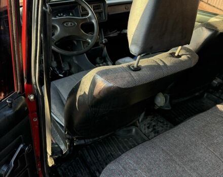 Красный ВАЗ 2104, объемом двигателя 1.5 л и пробегом 105 тыс. км за 1301 $, фото 6 на Automoto.ua