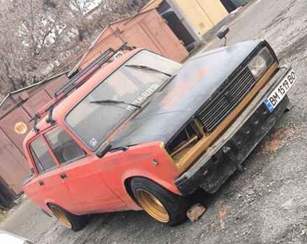 Красный ВАЗ 2105, объемом двигателя 1.5 л и пробегом 300 тыс. км за 350 $, фото 1 на Automoto.ua