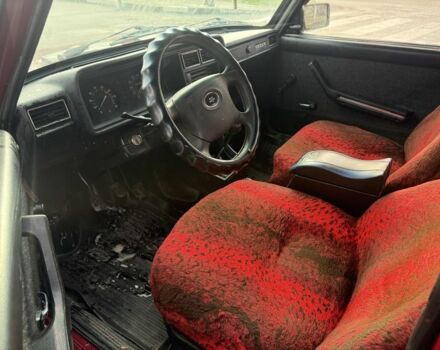 Красный ВАЗ 2107, объемом двигателя 1.5 л и пробегом 200 тыс. км за 593 $, фото 3 на Automoto.ua