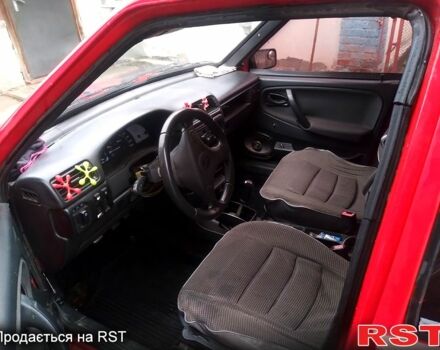 Красный ВАЗ 2109, объемом двигателя 1.3 л и пробегом 205 тыс. км за 1010 $, фото 6 на Automoto.ua
