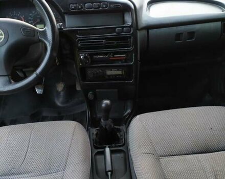 Красный ВАЗ 2109, объемом двигателя 1.6 л и пробегом 169 тыс. км за 1350 $, фото 4 на Automoto.ua