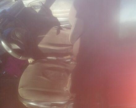 Красный ВАЗ 2109, объемом двигателя 1.5 л и пробегом 200 тыс. км за 592 $, фото 5 на Automoto.ua