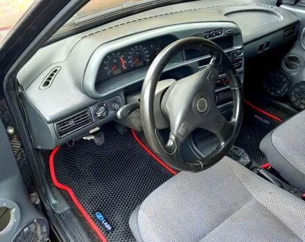 Черный ВАЗ 21099, объемом двигателя 1.6 л и пробегом 160 тыс. км за 1150 $, фото 4 на Automoto.ua