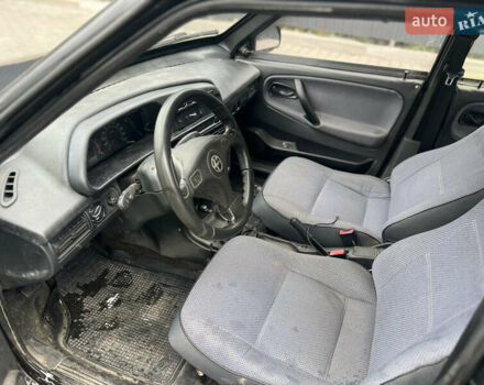 Черный ВАЗ 21099, объемом двигателя 1.6 л и пробегом 400 тыс. км за 1250 $, фото 10 на Automoto.ua
