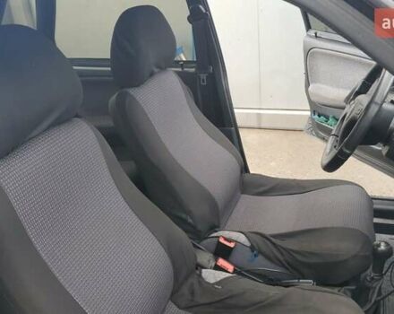 Чорний ВАЗ 21099, об'ємом двигуна 1.6 л та пробігом 183 тис. км за 2850 $, фото 19 на Automoto.ua
