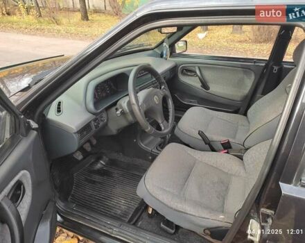 Черный ВАЗ 21099, объемом двигателя 1.6 л и пробегом 148 тыс. км за 2000 $, фото 4 на Automoto.ua
