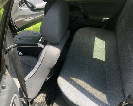 Черный ВАЗ 21099, объемом двигателя 1.6 л и пробегом 207 тыс. км за 2000 $, фото 5 на Automoto.ua